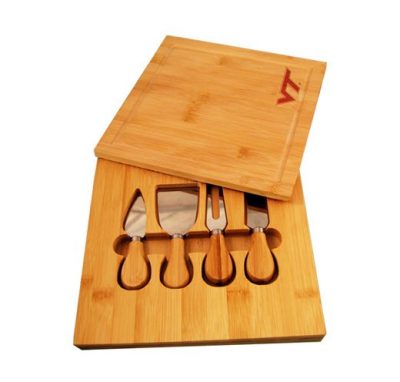 a cheese board with utensils