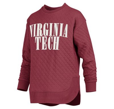 a maroon sweater