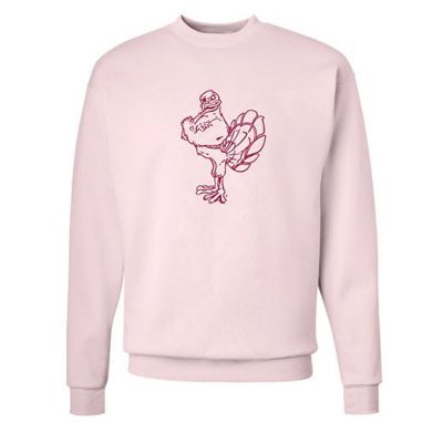 a pink sweater