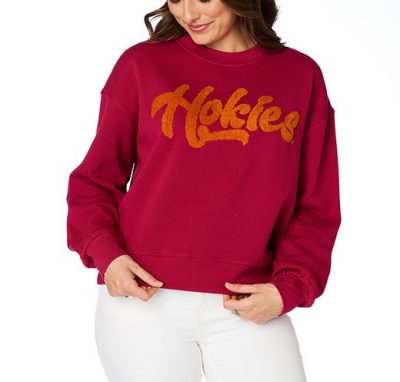 a maroon sweater