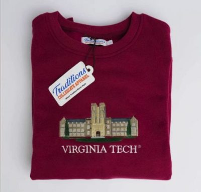 a sweater with a campus building embroidered on it