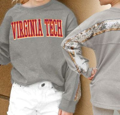 a grey sequined shirt