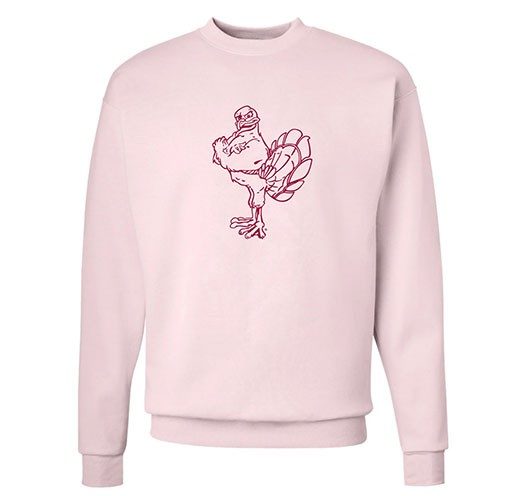 a pink sweater