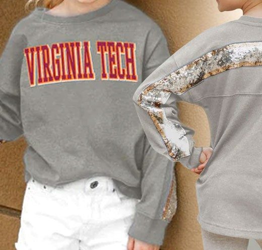 a grey sequined shirt